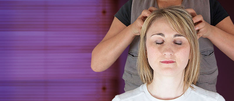 Image of client receiving Indian Head Massage