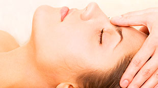 Image of client receiving Reiki